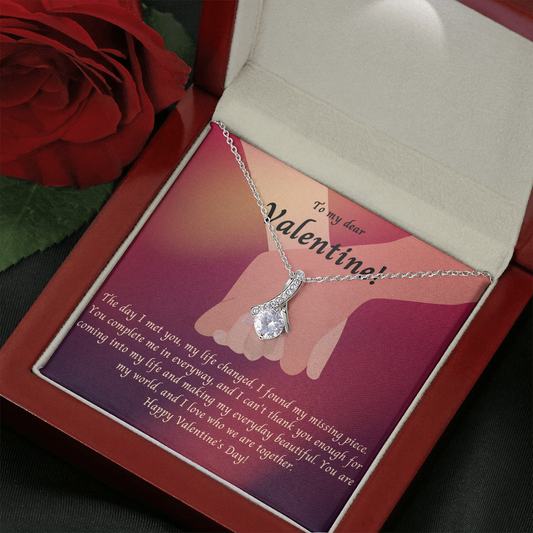 Alluring beauty, ribbon shaped necklace as a gift for your dear valentine on Valentine's Day.